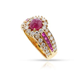 1980s Van Cleef & Arpels Ruby Cabochon and Diamond Halo Ring, 18k