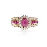 1980s Van Cleef & Arpels Ruby Cabochon and Diamond Halo Ring, 18k